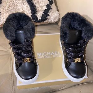 Michael Kors black printed sneakers with fur